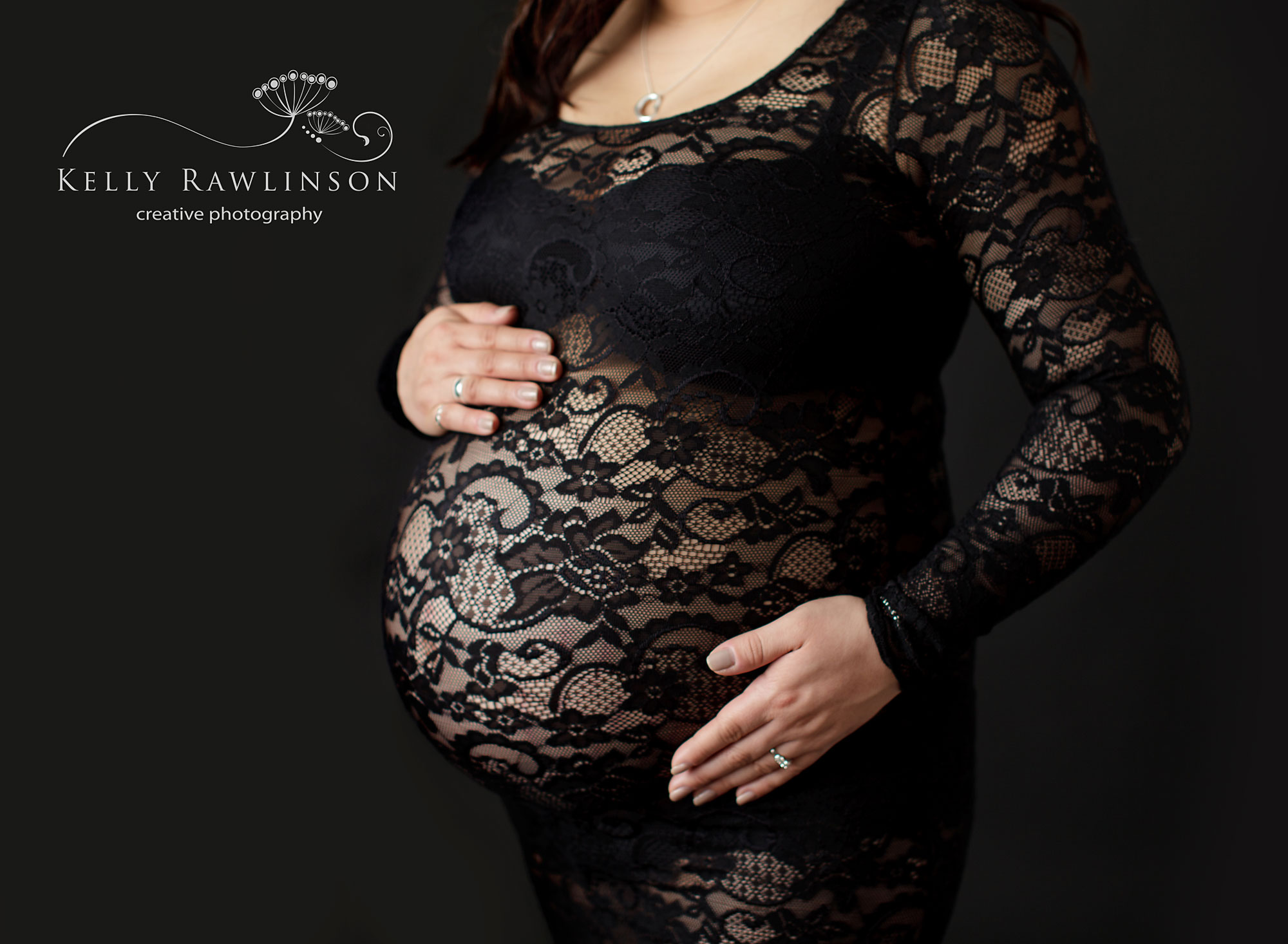 Maternity pictures, mother in black lace dress artistic pregnancy photos
