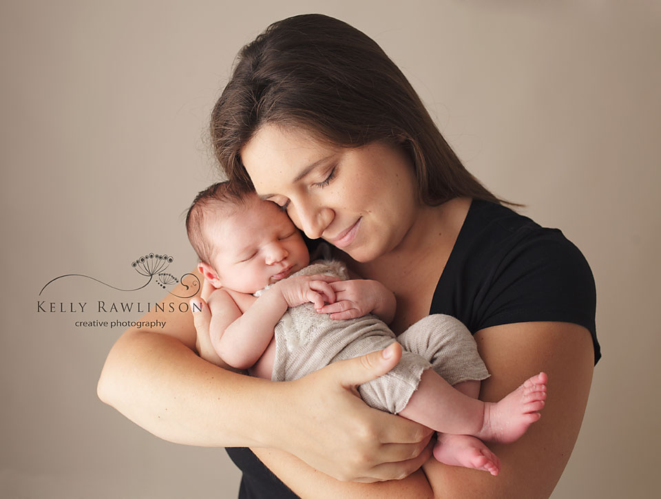 mom and baby, first family photograph, emotional family photos, newborn in mother's arms