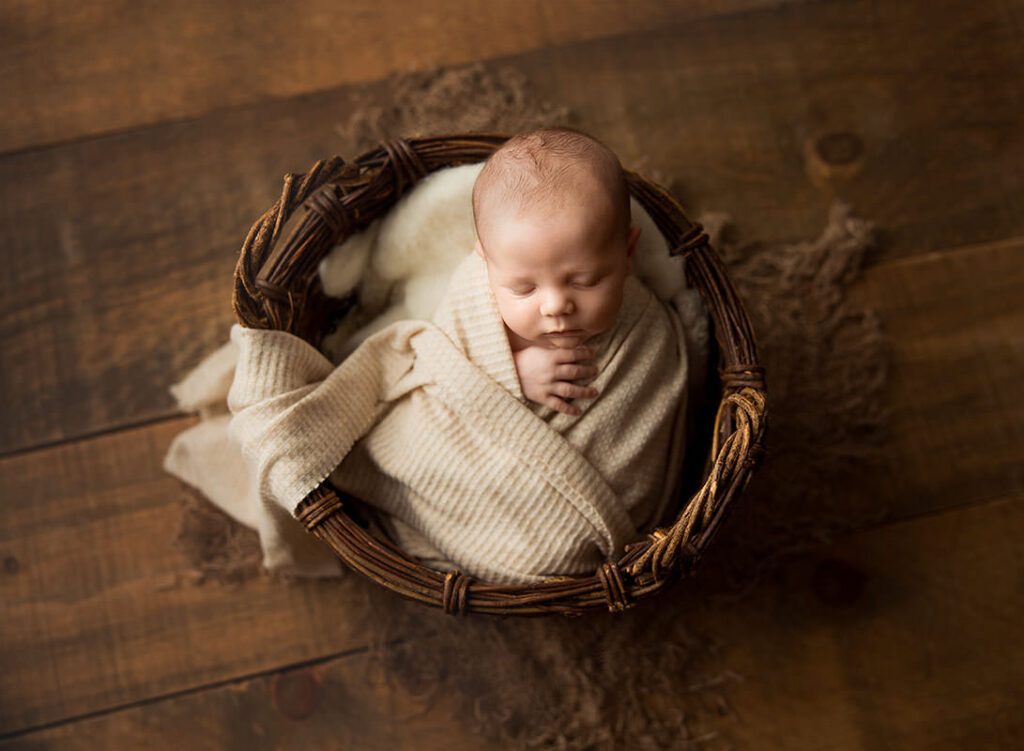 Newmarket Newborn Photography image of baby in basket