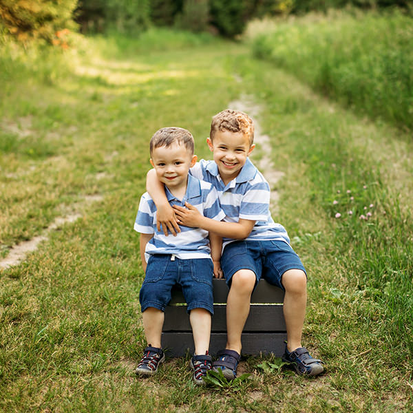 Brothers sitting on path, forest family photography, York Region