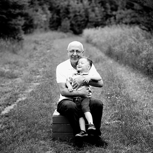 Grandfather and grandchild, black and white family photography