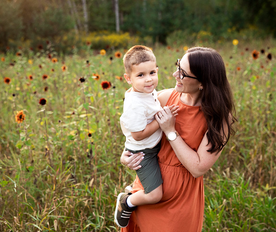 Flower farm family portrait of mother and son